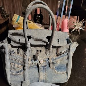 denim blue jean handbag with lock..luxurious ❤️